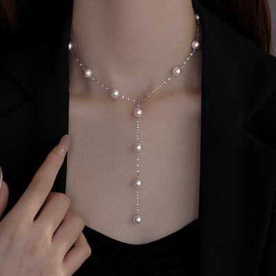 Collar de perlas rosa manta temperamento retro de nicho cadena para la clavícula moda de lujo ligero pendientes versátiles de alta gama