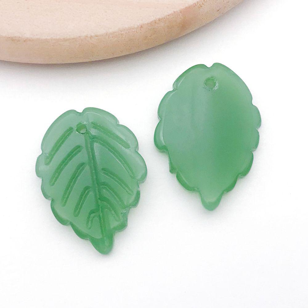 Set of 20 Green Transparent Faux Glass Leaf Pendants for DIY Bracelets, Necklaces, and Video Accessories.