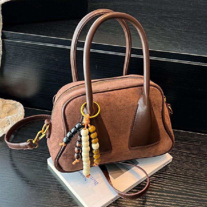 

Niche retro shoulder bag women s new fashion versatile handbag bowling commuter messenger bag коричневый