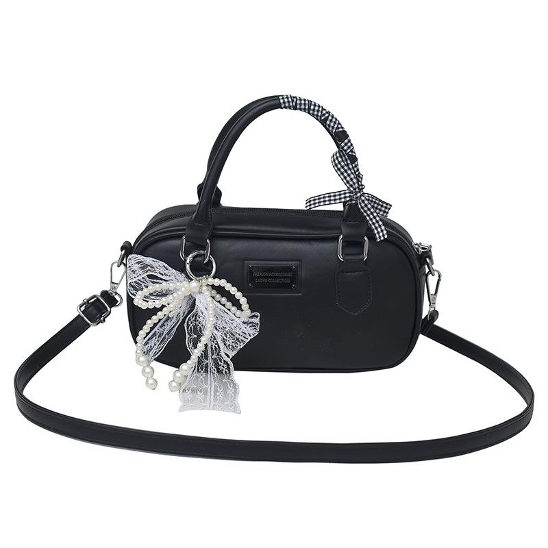 2025 spring and summer new simple and sweet style portable bowling bag casual versatile foreign style advanced sense messenger bag women