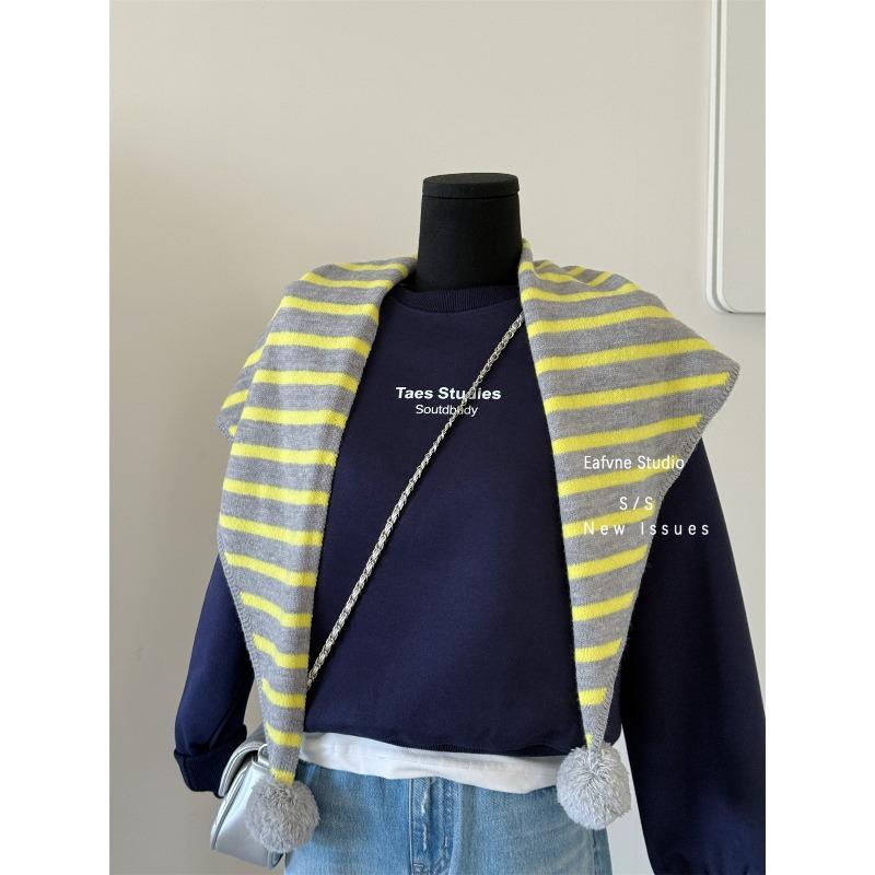 A Retro Hong Kong style Knitted Striped Pom pom with A Vintage Triangular Scarf Over It A Warm Autumn and Winter Decorative Shawl Scarf for Women