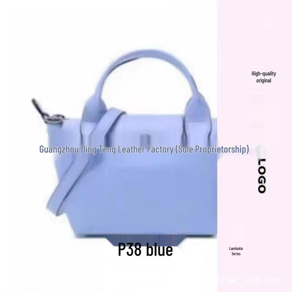 Hochwertige Mini-Knödeltasche aus Nappaleder mit Drachenprägung, Vielseitig für den Weg zur Arbeit, zum Tragen in der Hand, über der Schulter, mit verstellbarem Crossbody-Riemen.