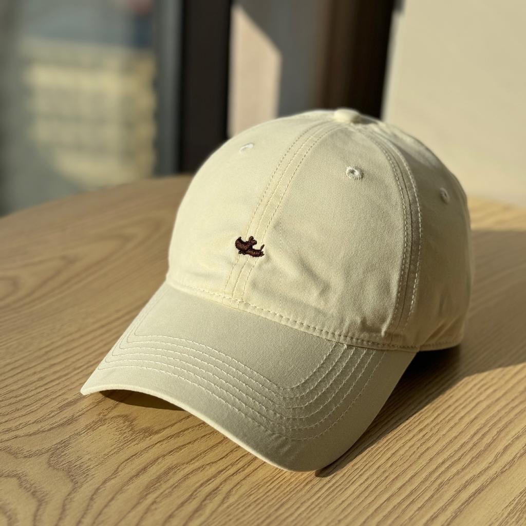 Korean-style versatile baseball cap with puppy embroidery for women, wide brim that makes the face look smaller, pure cotton slimming duckbill cap