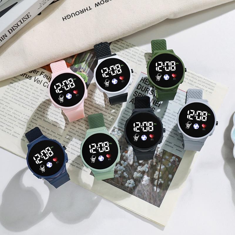 Popular And Stylish Round Electronic Watch For Children With Space Man Design High Tech And Trendy