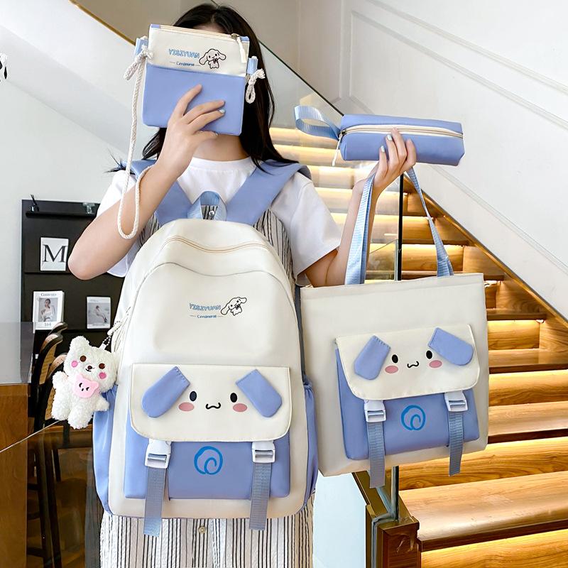 School bag new cartoon cute primary school schoolbag four-piece large-capacity middle school student backpack burden reduction casual backpack women