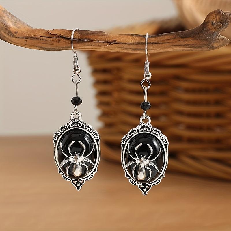 

Винтажные серьги-пауки с черными сапфирами и бусинами