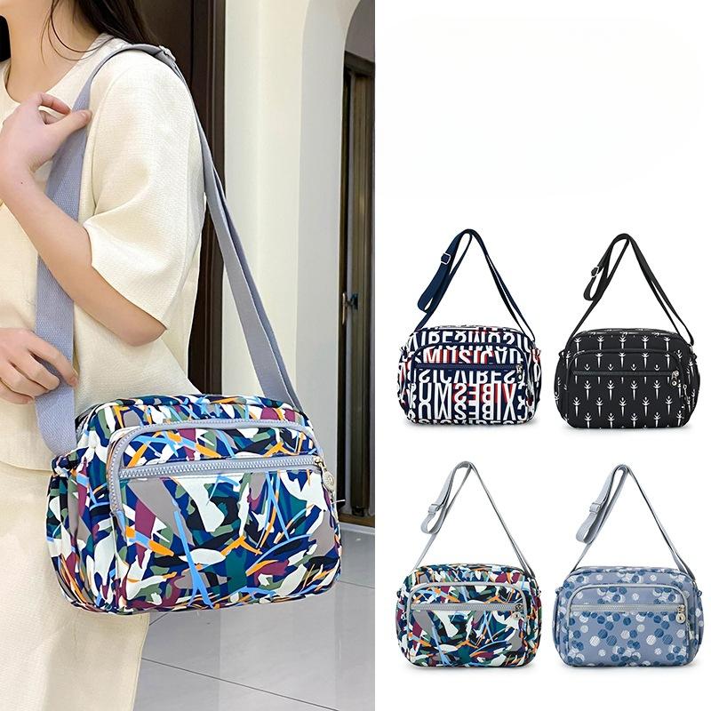 Women's Bag New Korean Version of Ladies' Cross Body Bag Multi Layer Large Capacity Cross Body Bag for Middle Aged Mothers.