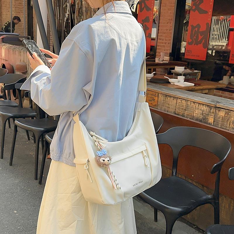 Korean version of messenger bag women's new simple large-capacity dumpling bag lightweight versatile satchel student shoulder bag tide