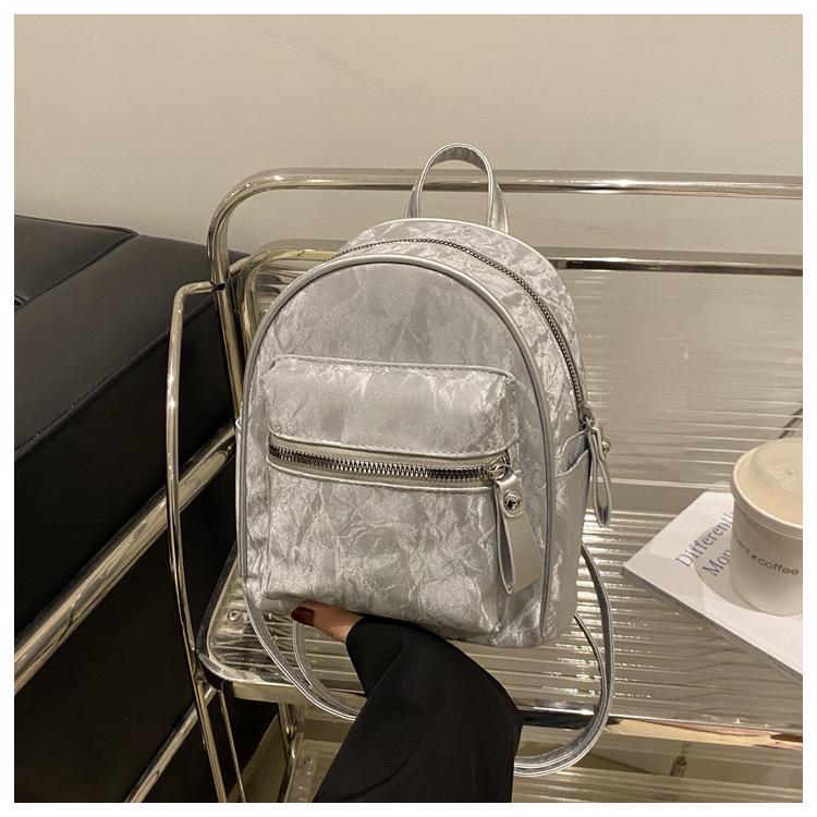 

Женский мини-рюкзак 2024 года для повседневных путешествий и учебы серебряный