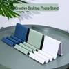 Universal Creative Phone and Tablet Stand for Desktop