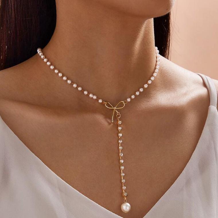 European & American Style Bow Long Pearl Tassel Choker Necklace: Fashionable Design with Clavicle Pendant for Women золотой