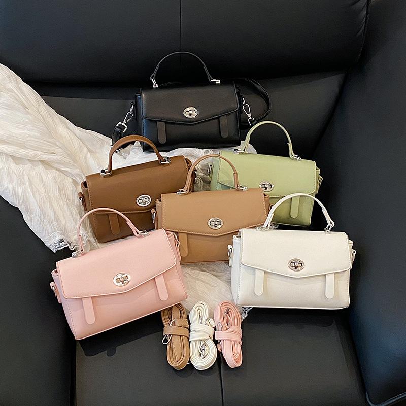 Summer new fashionable solid color lock flip bag versatile portable shoulder oblique span women's bag