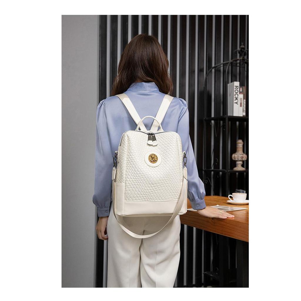 2024 Nowy damski plecak projektant wysokiej jakości miękka skóra prosty splot modny plecak duża pojemność torby szkolne na ramię