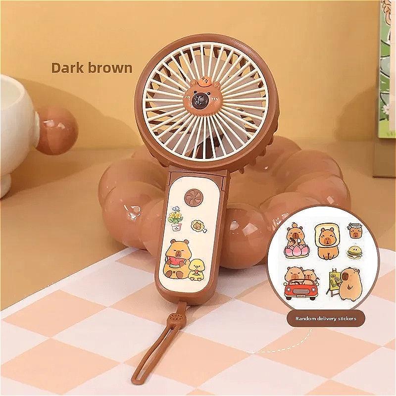

Capibala Powerful Mini Handheld Fan - 3-Speed Portable USB Fan, High Wind Cooling for Summer, Rechargeable & Compact коричневий