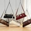 Pochette Baguette Mondaine 2025: Sac à bandoulière rond en métal polyvalent