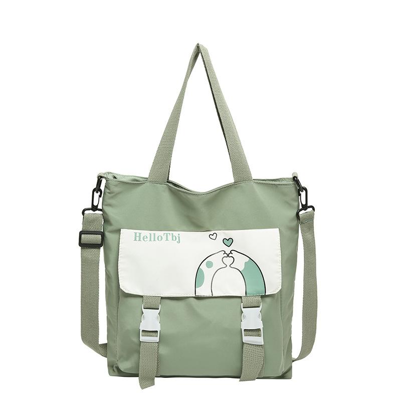 

2024 new canvas printing women s shoulder messenger bag large capacity versatile student class tote bag tide зелений