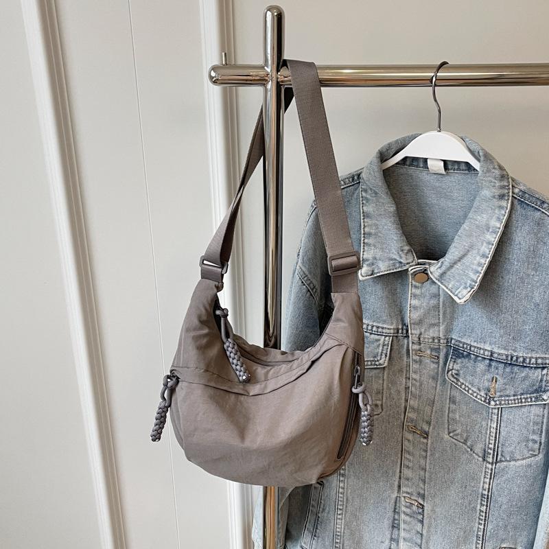 

Женская сумка-мессенджер большая вместительная сумка 2025 новая сумка на плечо спортивный универсальный рюкзак сумка-пельмень