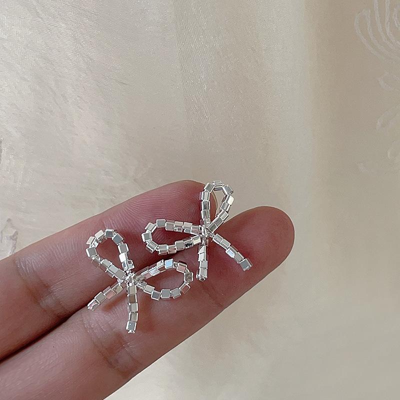 Sparkling Metal Bow Earrings Women'S Niche Design Personality Simple Temperament Versatile Fashion Earrings