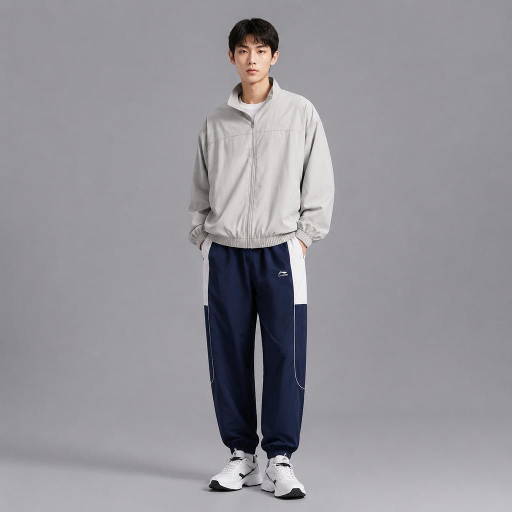 Li Ning Serie Tendenza Sportiva Pantaloni Jogger in Maglia Spliced Vita Media Traspiranti Versatili Uomo fondo Blu Marina AYKV105-2