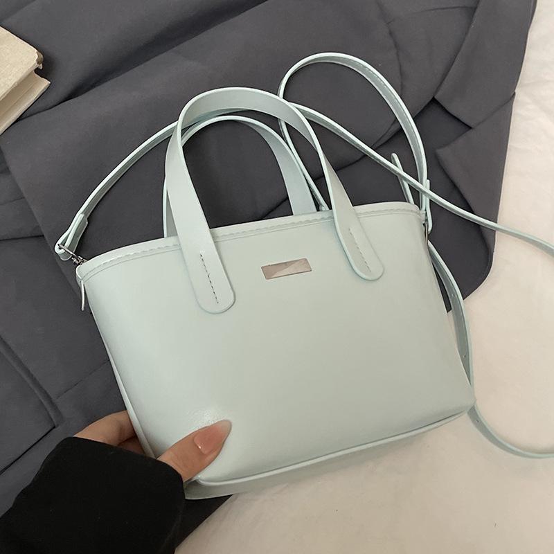

Spring and summer hot sale Korean version of Macaron color simple portable bucket bag niche fashion versatile casual messenger women s bag