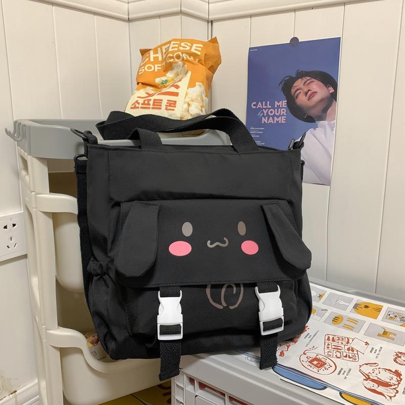 

Cute ins student messenger bag soft girl new class shoulder bag college style retro mailman portable canvas bag чорний