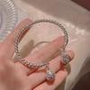 Ding Dang Bracelet: Personalized Double Palace Bell with Twisted Wire