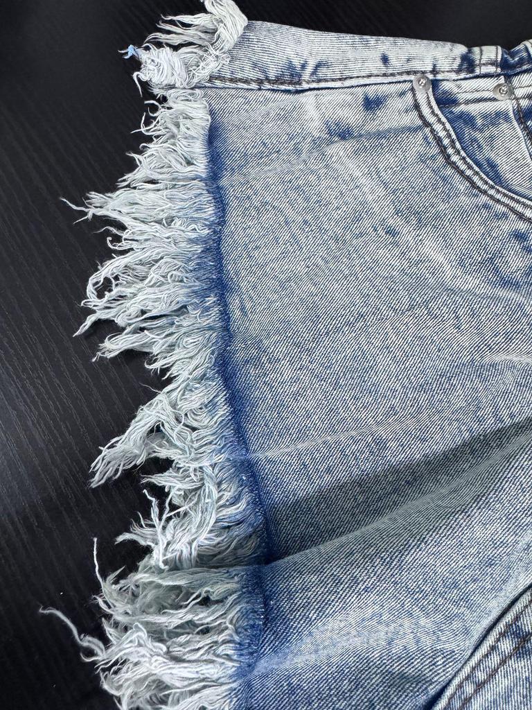 Shorts en jean déchirés taille haute à franges pour femmes style européen et américain 2024