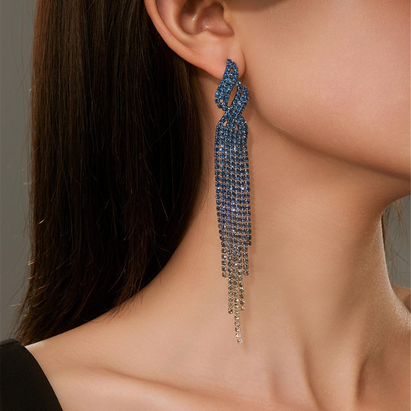 

Модний темперамент Блискучі діамантові довгі сережки з бахромою