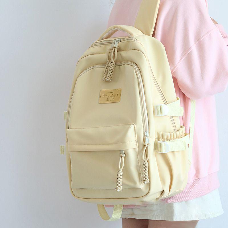 

Casual and Lightweight Girls Schoolbag Three to Six Grade Backpack Girls Junior and Middle School Students Large Capacity Backpack College Students Small size yellow