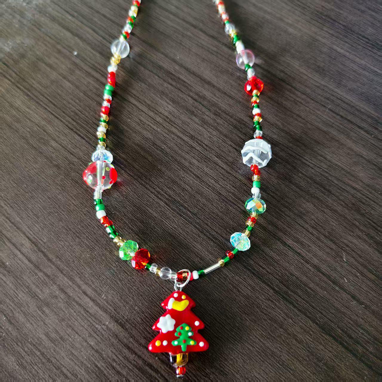 

Праздничная подвеска в виде рождественской елки из муранского стекла с кристальными яблоками