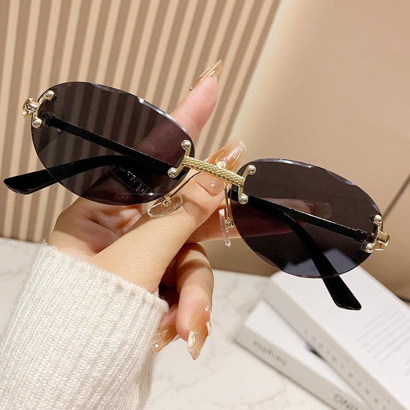 Rimless Punk Vintage Oval Sunglasses Women For Men Luxury Brand Designer Sun Glasses Popular Metal Rivet Hip Hop Shades Uv400