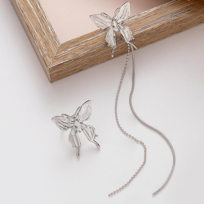 

Lux Butterfly Tassel Ear Cuff: Cool-Toned Asymmetrical Cartilage Clip Earrings