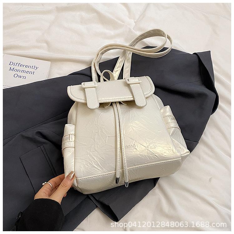 

Fashion burst pattern backpack bag women s 2025 new leisure explosion travel small backpack large capacity student bag