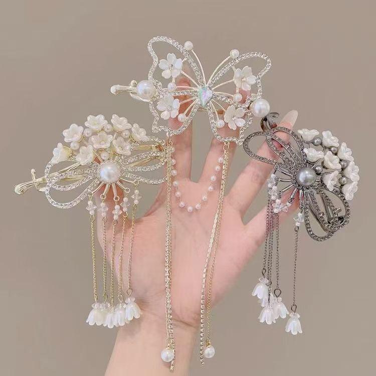 Pince à cheveux papillon à pampilles perle rouge automne/hiver 2025 pour femmes