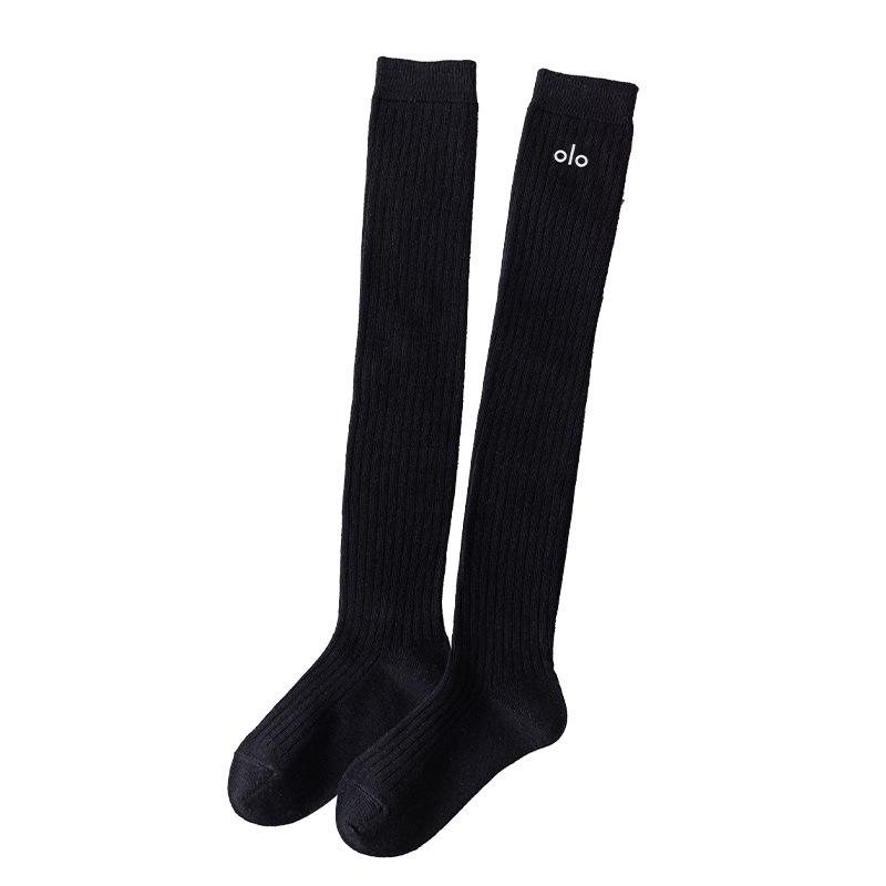 

Дівчачі гольфи вище коліна в британському стилі однотонні, з тисненими літерами та наколінниками - чорно-білі XXL 12-15 years чорний