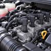 Automotive Ignition Coil 56028138AF 56028138AD for Vehicle Spark-System Replacement with ABS Housing, Metal Parts, Integrated Mounting Point, and Male