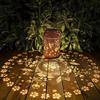 Solar Lantern Featuring a Hummingbird Design, Perfect for Outdoor Decor. It Includes a 600Mah Rechargeable Battery, Making It Ideal for Yard Art