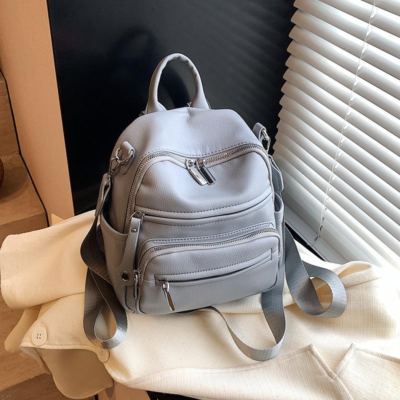 Fashion casual backpack women's new trend versatile student bag high sense class commuter women's bag
