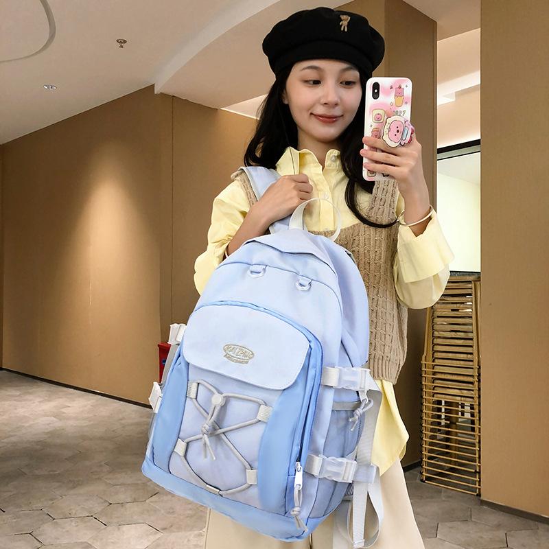 

Backpack female college student junior high school student schoolbag new fashion high sense simple large capacity travel backpack синій
