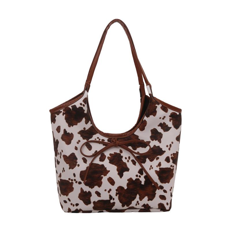 

Сумка высокой ценности 2025 новая в иностранном стиле с коровьим узором модная ретро сумка-тоут большой вместимости универсальная для поездок на работу на плечо коричневый