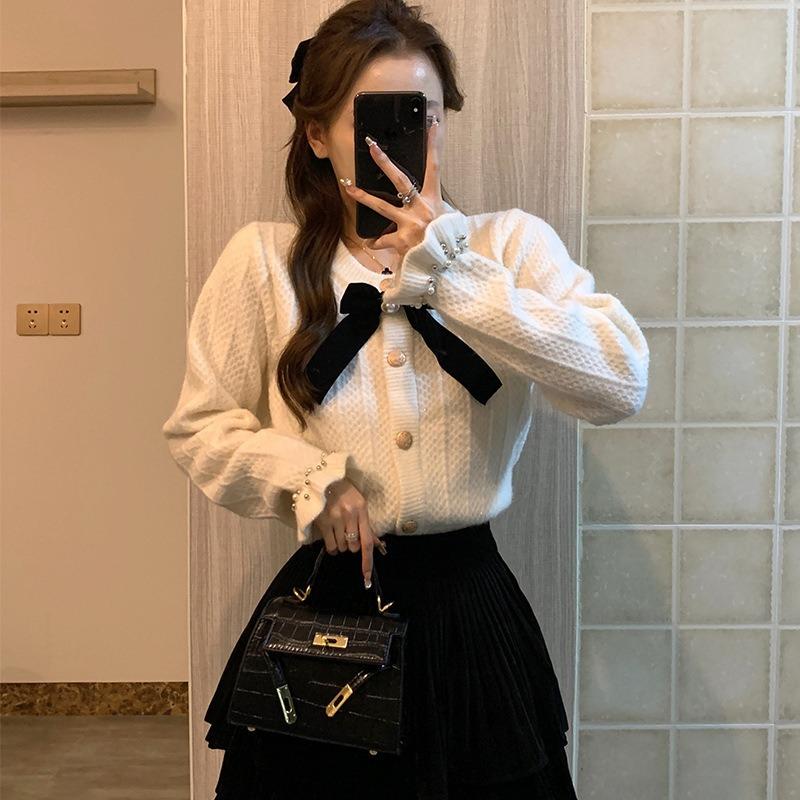 New light ripe women's clothing bow trendy jacket knitted cardigan women's niche design sense gentle bright silk sweater