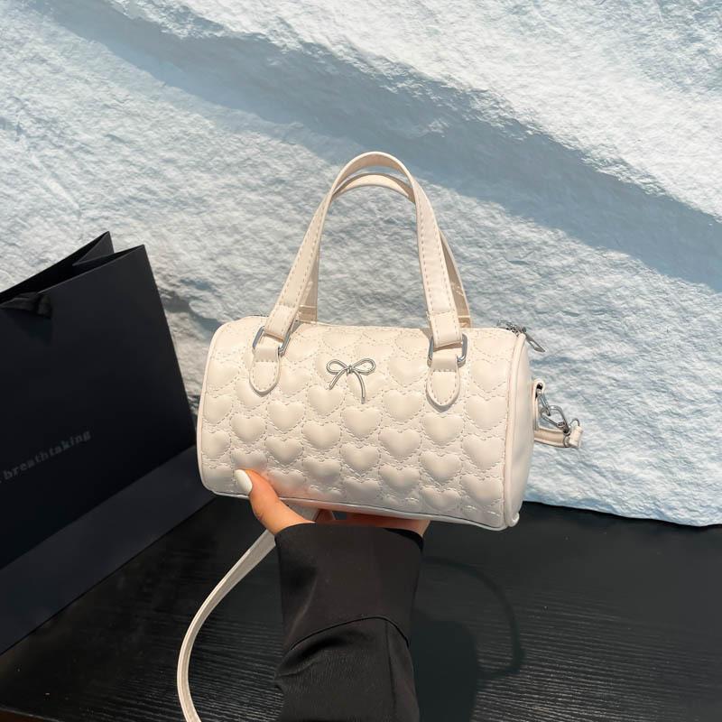 New summer popular casual and beautiful fresh solid color bow cylinder bag portable shoulder messenger bag women's bag