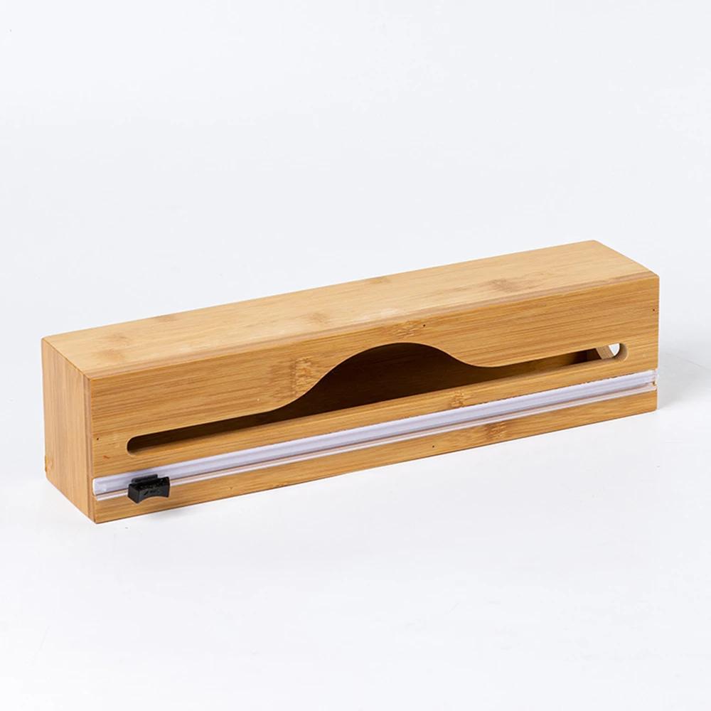 A wooden kitchen cling film dispenser, kitchen drawer aluminum foil and wax paper dispenser