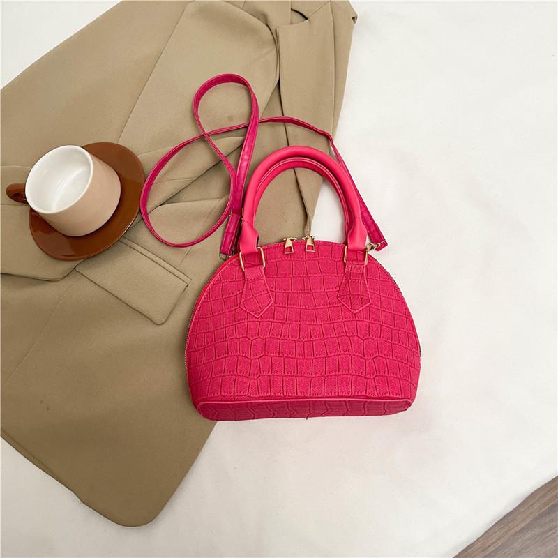 

2025 spring new fashion simple solid color shell bag texture trendy handbag high sense small round bag versatile розы красного