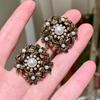 Vintage Distressed Pearl Stud Earrings with Floral Metal Design
