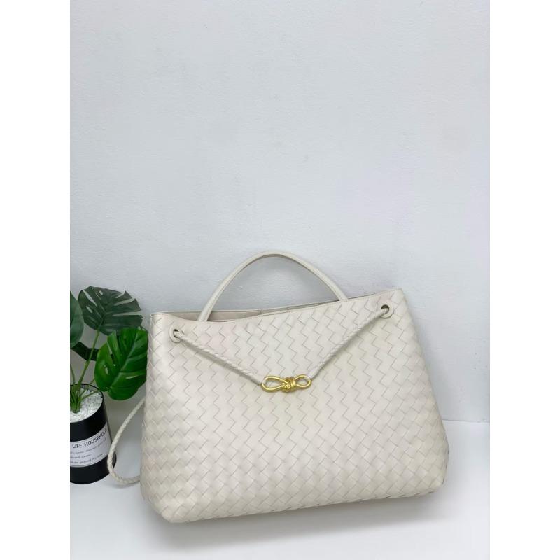 oversized bow metal rope buckle cowhide woven bag women's autumn and winter new leather large-capacity handbag