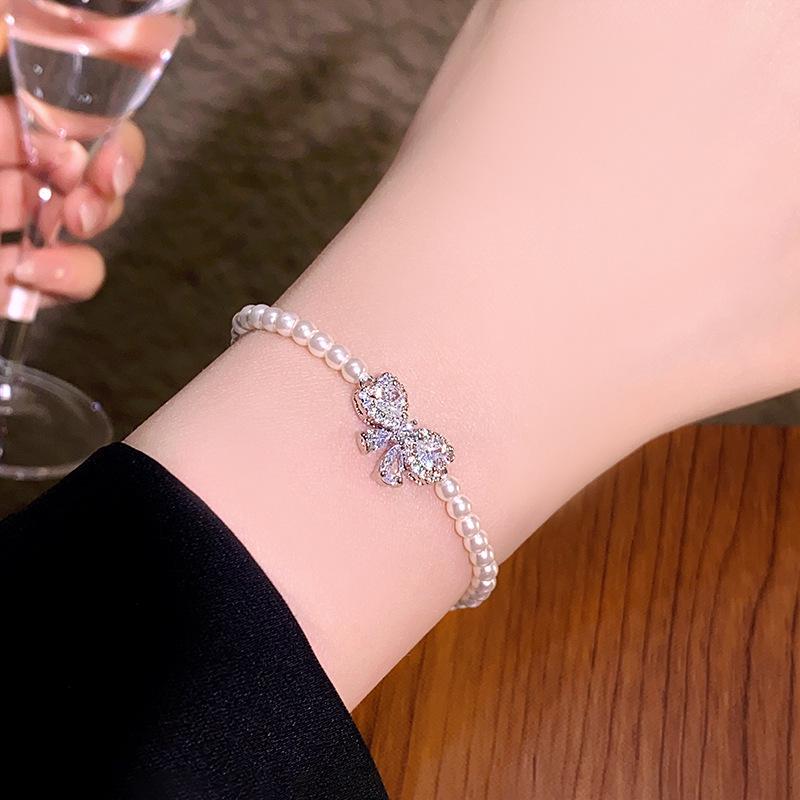 Elegant Pearl & Diamond Beaded Bow Bracelet - Chic, Versatile, and Luxurious Hand Jewelry