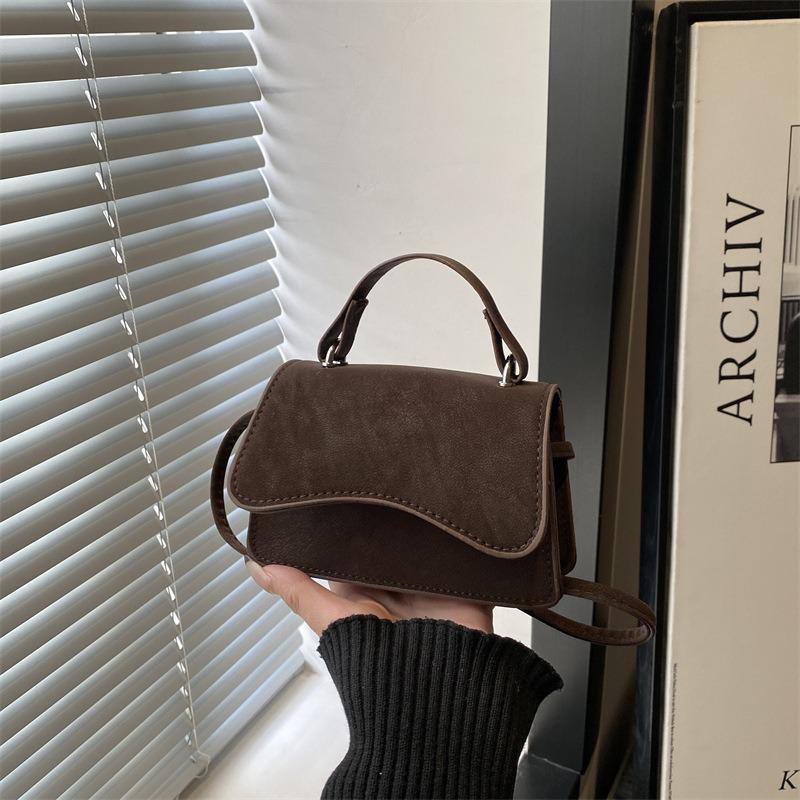 Retro lässige Pendlertasche Frühling neue Mode Textur einfarbig tragbar Schulter Crossbody kleine quadratische Tasche
