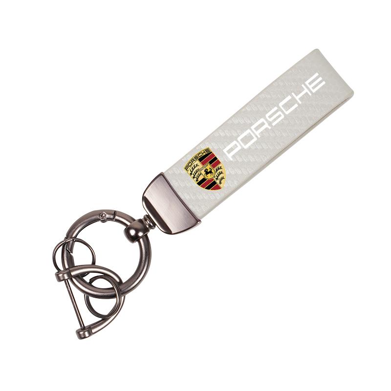 

Car Shield Emblem Leather Keychain Carbon Fibre Key Chain For Porsche 911 718 Taycan Panamera Cayenne Macan Boxster Cayman Pajun