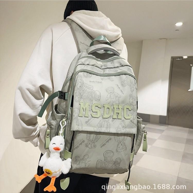 Schoolbag new schoolbag girls reduce burden spine protection large capacity middle school students high school students trendy cool boys backpack
